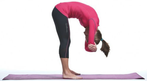 Fists Forward Bend Yoga